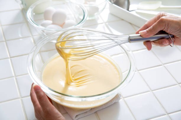 istock Making pancakes, close-up of cooking scene 1986487862