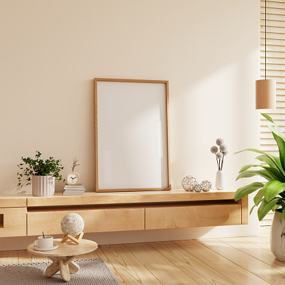 Poster mockup with vertical wooden frame,Mockup frame in cozy home interior background- 3D rendering