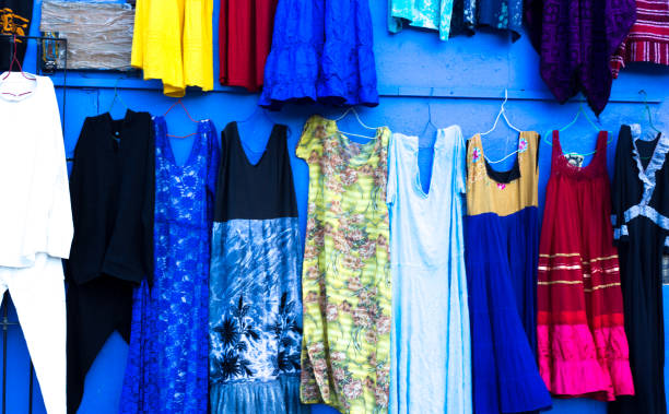 oaxaca, mexico: colorful dresses at street stall - mexico dress market clothing imagens e fotografias de stock