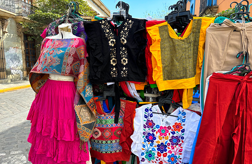 Oaxaca, Mexico: Colorful Embroidered Clothing at Street Stall