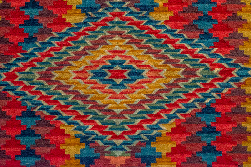 pre-Hispanic serape with embroidery in the form of multicolored fretwork that forms an original and very Mexican pattern