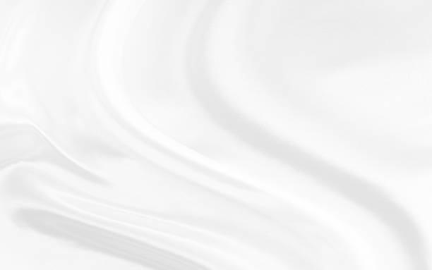 istock White gray satin texture that is white silver fabric silk background with beautiful soft blur pattern natural. 1986728600