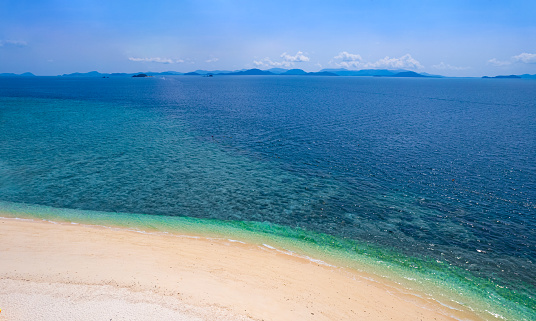 Aerial view of  Island in the Andaman Sea. natural blue sea Tropical seas of Thailand The beautiful scenery of the island is very impressive.