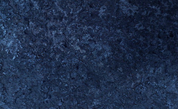 istock Dark rough cement wall background for graphic design 1986790459