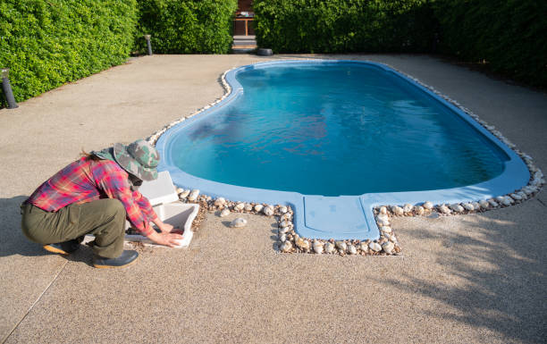 istock Technician trying to fix swimming pool pumps. 1986845333