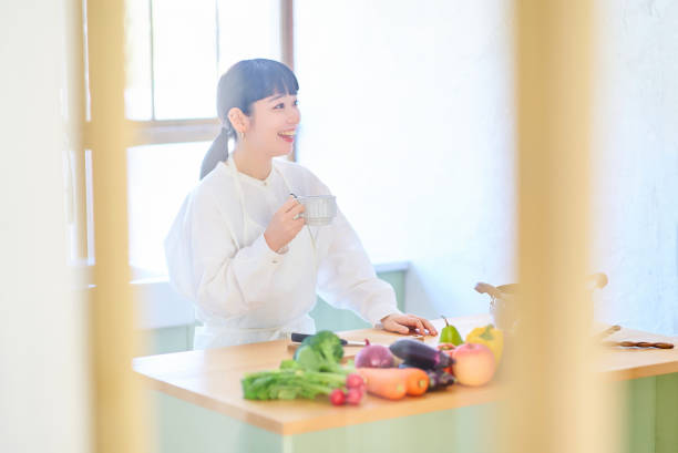 istock Young woman relaxing in the kitchen 1986845338