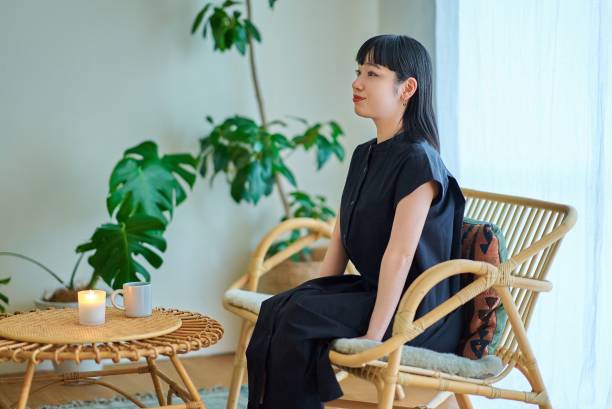 istock young woman relaxing in the room 1986846363