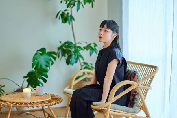 istock young woman relaxing in the room 1986846377