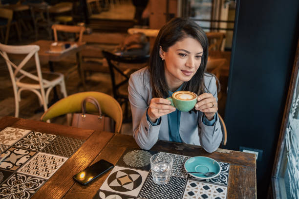 istock I enjoy a cappuccino and a break from work in my favorite cafeteria 1986863072