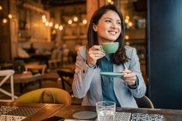 istock I enjoy a cappuccino and a break from work in my favorite cafeteria 1986863382