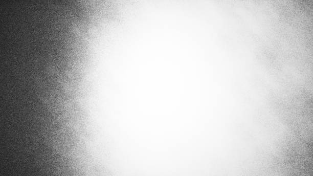 istock Gray grainy background with shades. 1986960251