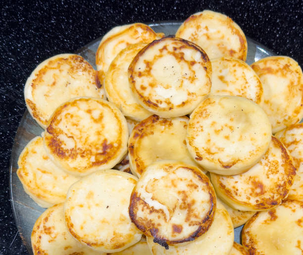 istock Pancakes on a counter in a market 1986961880