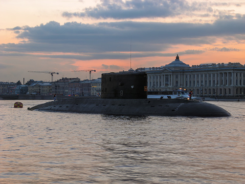 St. Petersburg, Russia - August 23, 2014: Submarine surfaced on Neva river. Sunset