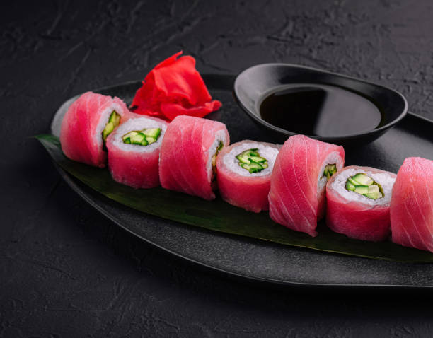 istock Japanese uramaki tuna roll with cucumber 1987033661