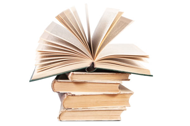 istock stack of old books isolated on white background 1987047403