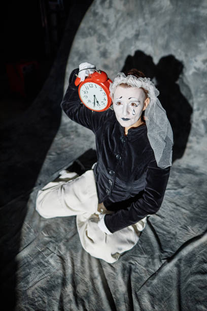 istock Mime Performing Act on Stage with Veil 1987064861
