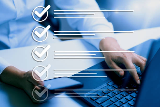istock Survey form, check marks on checklist, document control, filling online form and answering questions, business project concept. 1987073942