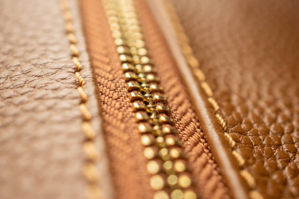 istock close up of zipper on brown leather bag 1987085103