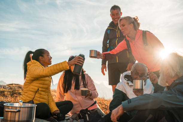 istock Diverse Group of Friends Taking a Break with Hot Drinks 1987087411