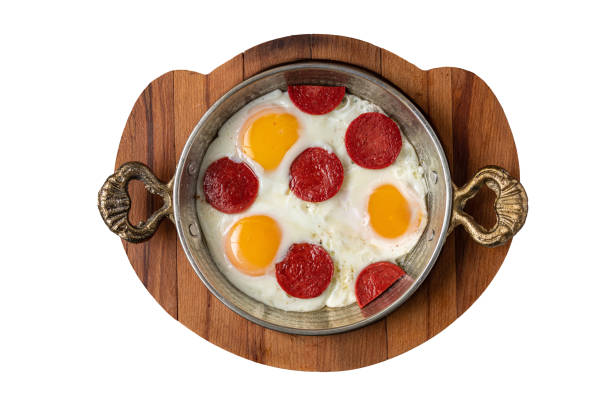 istock fried eggs with turkish sausage with bread and tea on dark white background 1987104353