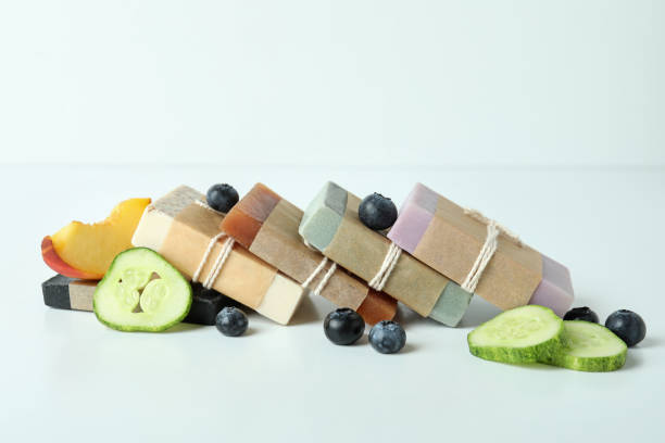 istock Different natural soap for skin care on white table 1987107642