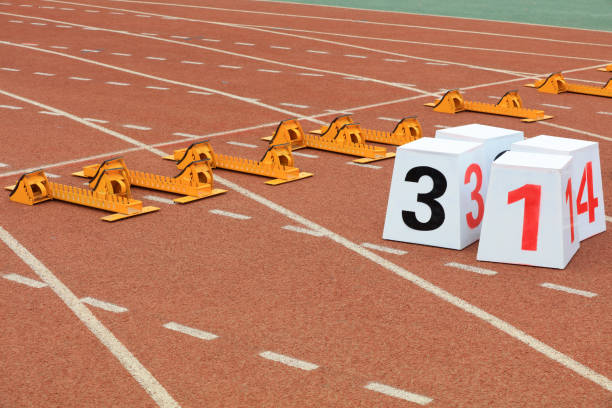 istock Track numbers and starters on the plastic track on the playground 1987114512
