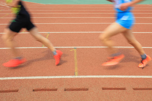 istock Long distance runners are running on the track 1987115046