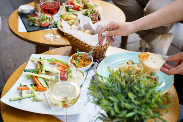 istock People Eating at an Outdoor Brunch 1987122459