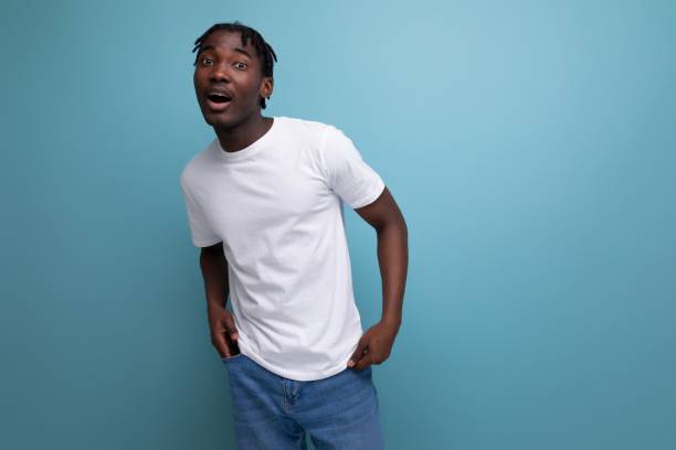 istock african young man with dreadlocks dressed in a white t-shirt for thermal printing 1987139550