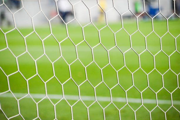 istock Soccer goal net on a soccer field. 1987141168