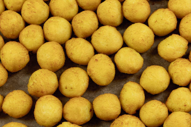 istock “hazelnut” potatoes, in a large dish, in a baking dish 1987158845