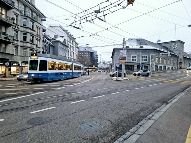 Zurich Enge Railway Sttaion. The first Building was opened in 1875, the new building was realized between 1925 and 1927. The station building is constructed of granite from the Ticino.The image shows the Railway Station during winter season after some snoffall.