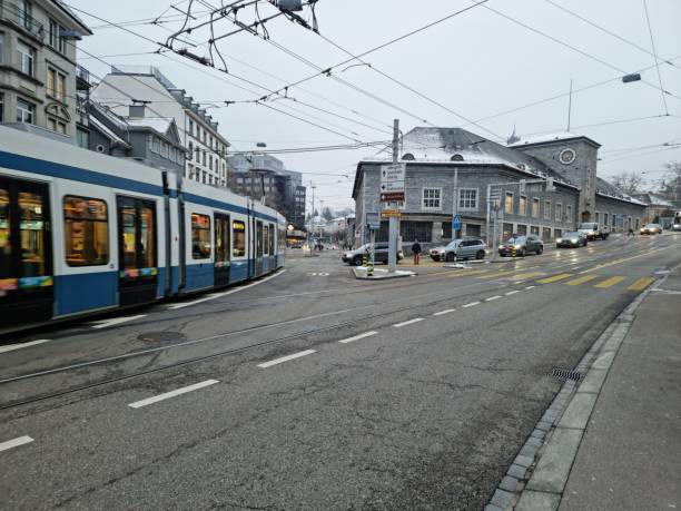 Zurich Enge Railway Sttaion. The first Building was opened in 1875, the new building was realized between 1925 and 1927. The station building is constructed of granite from the Ticino.The image shows the Railway Station during winter season after some snoffall.