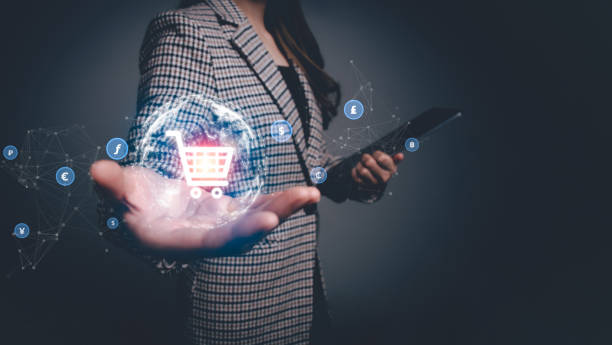 istock Digital marketing online, social commerce, Online shopping, internet shopping, E-commerce concept. Businesswoman holding virtual info graphics with shopping cart icon circle global network connection. 1987161061