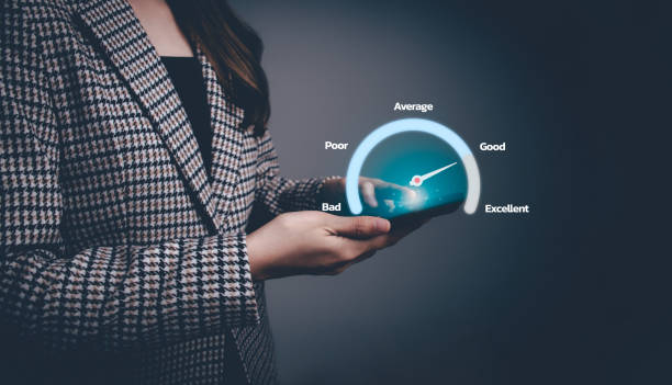 istock Customer service experience. Evaluation and customer satisfaction after use product. Business satisfaction survey concept. Businesswoman using smartphone to select good level for client. 1987162178