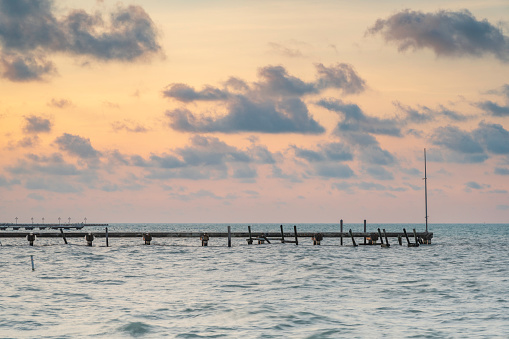 Sunrise over wooden jetties in Key West, Florida