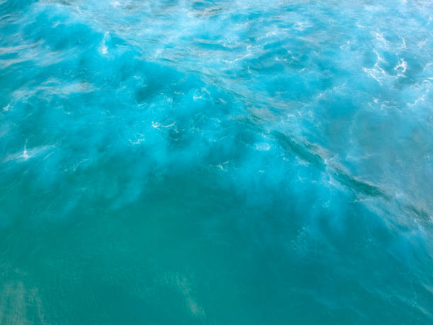 istock Beautiful view of bright turquoise ocean waves 1987200322