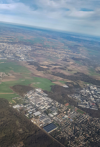 A view of the suburbs of Paris city, France, before the plane approaches and lands at Charles de Gaulle Airport in this city