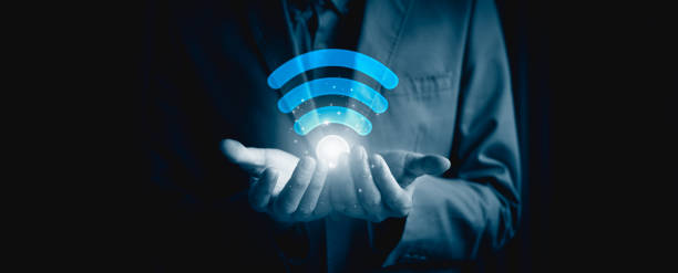 istock Wifi internet access concept, Business people connect WiFi technology. connect instantly via smartphone and high-speed hotspot. Fast internet wifi hotspot sharing. Working with various applications 1987214327