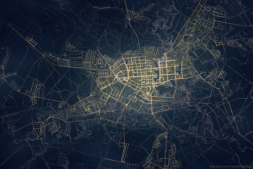 Aerial view of a city with night lighting, a virtual map with transport traffic on a city roads, Yoshkar-Ola, Volga region, computer graphic