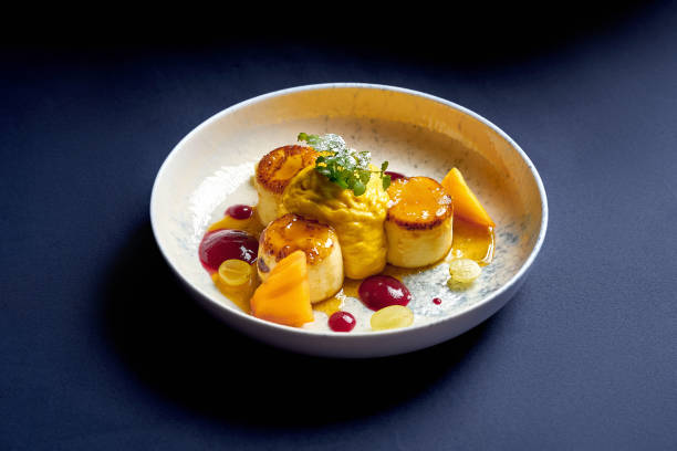 istock Ukrainian cheese pancakes with custard in a plate. Syrnyky 1987222578