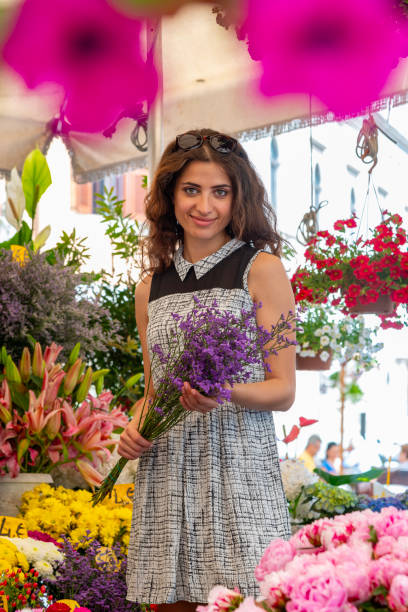 woman at flower market - rome flower market store flower ストックフォトと画像