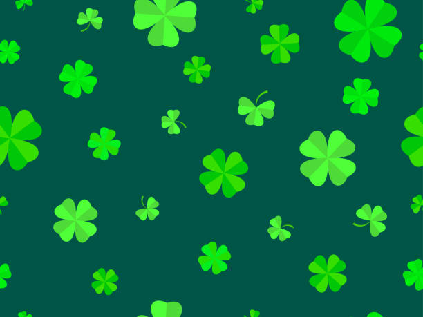 istock Seamless pattern with green clover leaves for St. Patrick's Day. Trefoil and four-leaf clover is a symbol of good luck. Design for promotional products, cards and prints. Vector illustration 1987263211