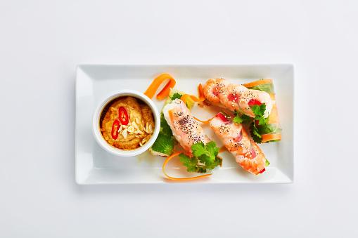 Seafood, shrimp and sauce dish in studio on white background from above for luxury cuisine. Restaurant, catering and dinner serving with fresh prawn recipe on plate for health, diet or nutrition