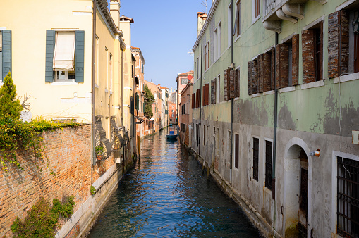 A classic scene of the iconic canals of Venice, Italy.
