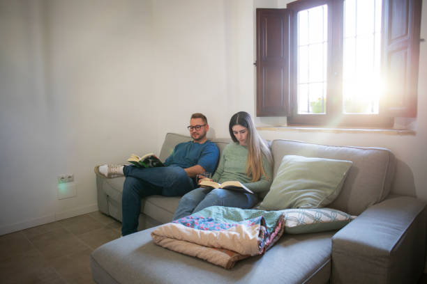 istock Couple on the sofa at home 1987325183
