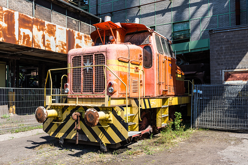 Hattingen, Germany - August 9, 2022: Diesel locomotive Diesellok 52 at Henrichshutte, a de-commissioned steelwork. Today a famous heritage museum site in Ruhr area, Hattingen, NRW, Germany.