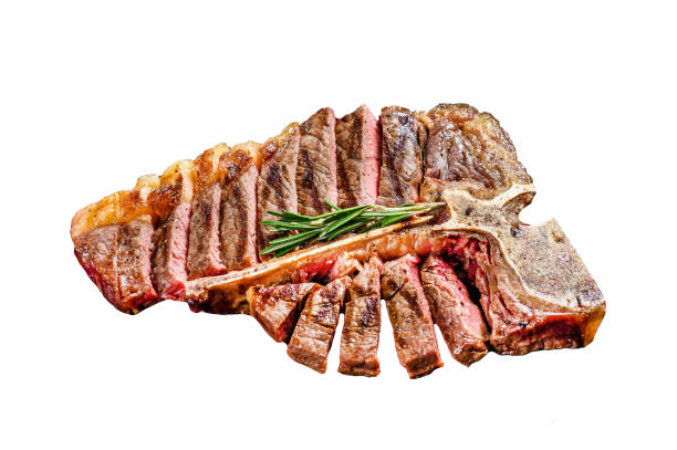 istock Sliced Grilled T-bone steak. Cooked tbone beef meat.  Isolated on white background. Top view. 1987353700