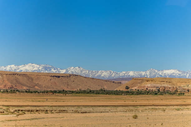 istock Fantastic view of a ksar between Ouarzazate and Ait Ben Haddu, illuminated by sunset. 1987377310