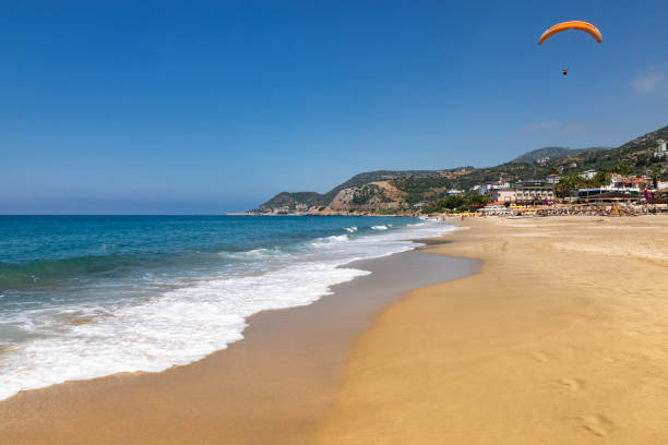 istock Paraglider soaring above Kleopatra Beach Alanya Turkey 1987378435